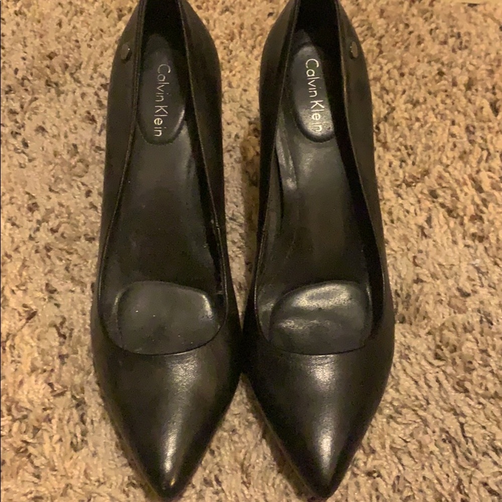 Black Calvin Klein pumps
